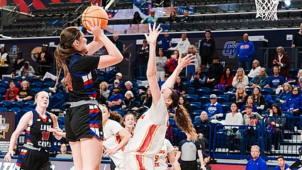 Grace Foster elevates for a shot in the Elite Eight game