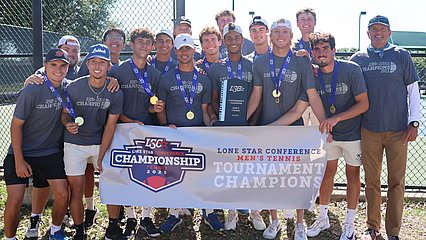 LCU's men's tennis team holding a banner reading "tournament champions"