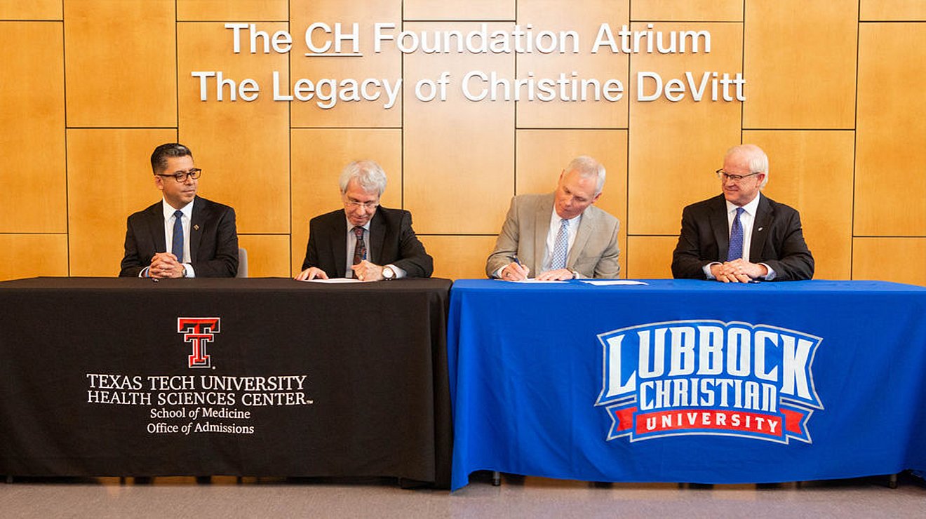 Texas Tech University Health Science Center officials, Dr. Foy Mills, Jr., and Dr. Stacy Patty signing agreement