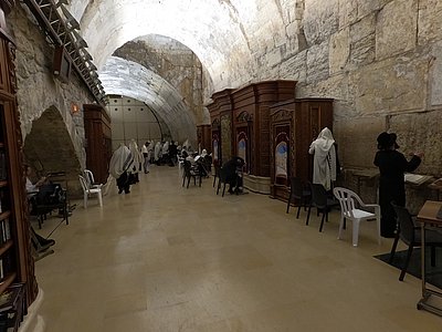 A view of the Wailing Wall in Jerusalem's Old City, showcasing its historical significance and the solemn atmosphere of prayer