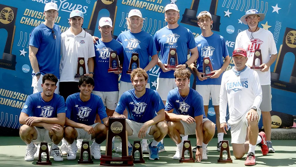 LCU Tennis team posing with Final Four trophies