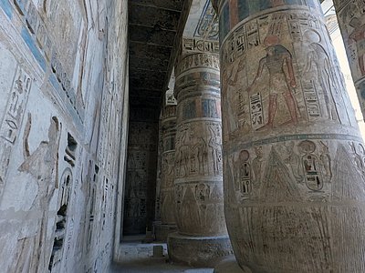 Columns in the Great Hypostyle Hall decorated with intricate Egyptian designs and colors