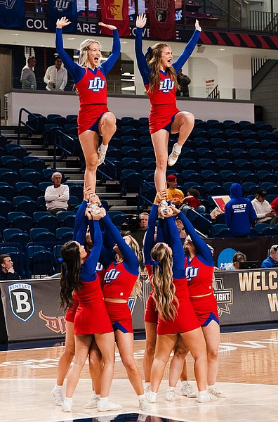 LCU cheerleaders cheering on the LCU crowd