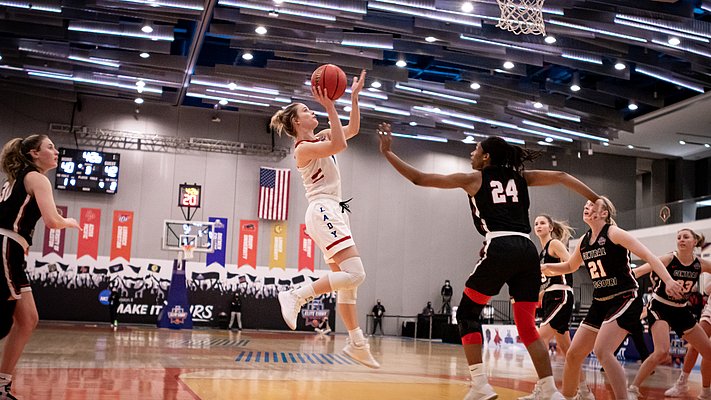 Allie Shulte, who finished with 24 points, makes a tough shot in the semifinal match