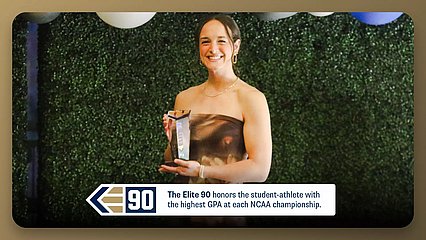 Audrey Robertson poses for a photo as she receives the Elite 90 award