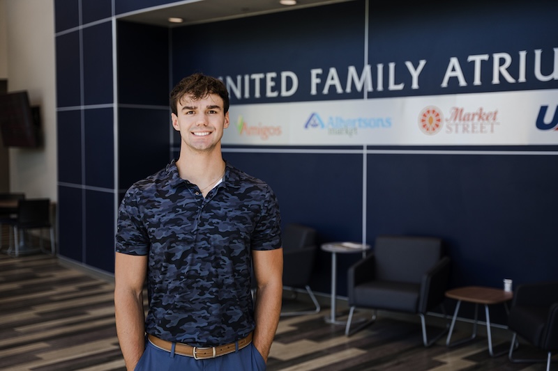 Trael posing in the Center for Business