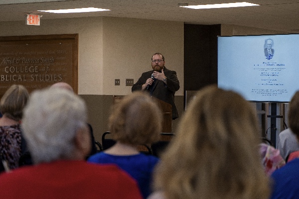 Dr. Jeremy Hegi addressing the audience at the dedication ceremony