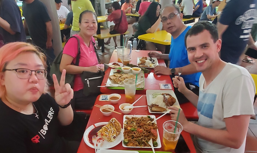 Student in Indonesia eating in cafe 