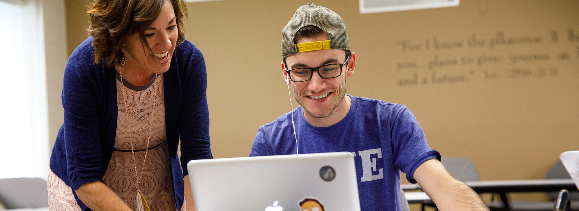 Teacher tutoring student