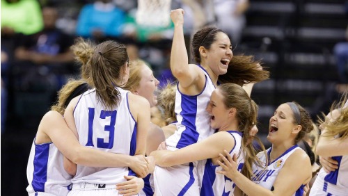 2016 women's basketball team celebrating after championship win